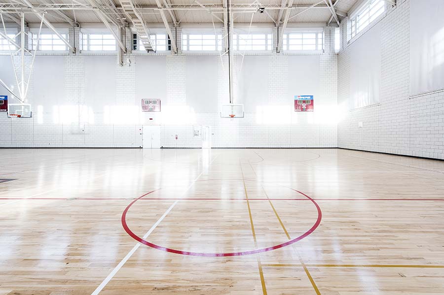 Photo of Wiegand Gym from the side of the court with view of scoreboard